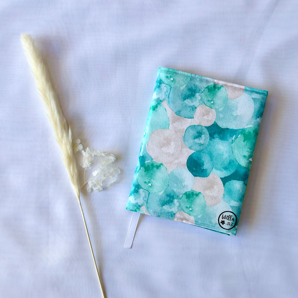 Willa Well Child/Plunket book cover with blue, white and green bubble print