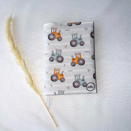 Tractors at Play Plunket/Well Child Book Cover